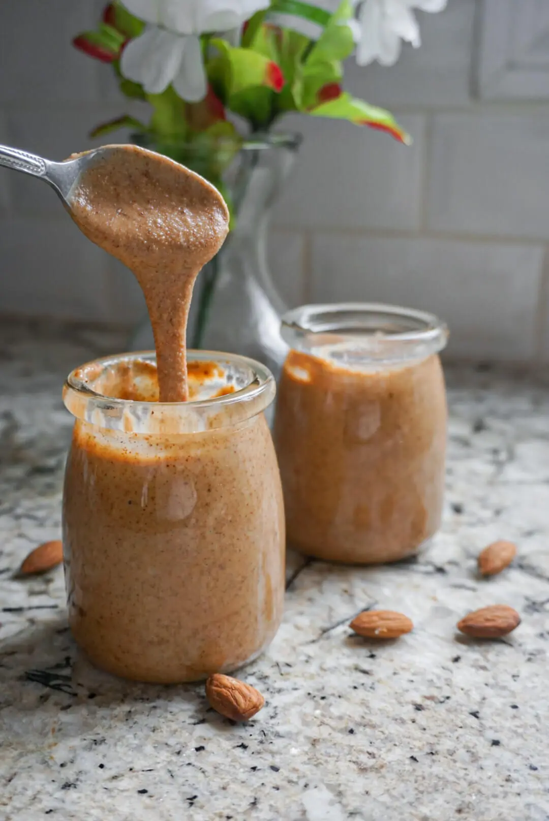 Simple, easy and delicious, this Homemade Almond Butter truly is the best! 1 ingredient and 15 minutes later you'll have the best almond butter ever!