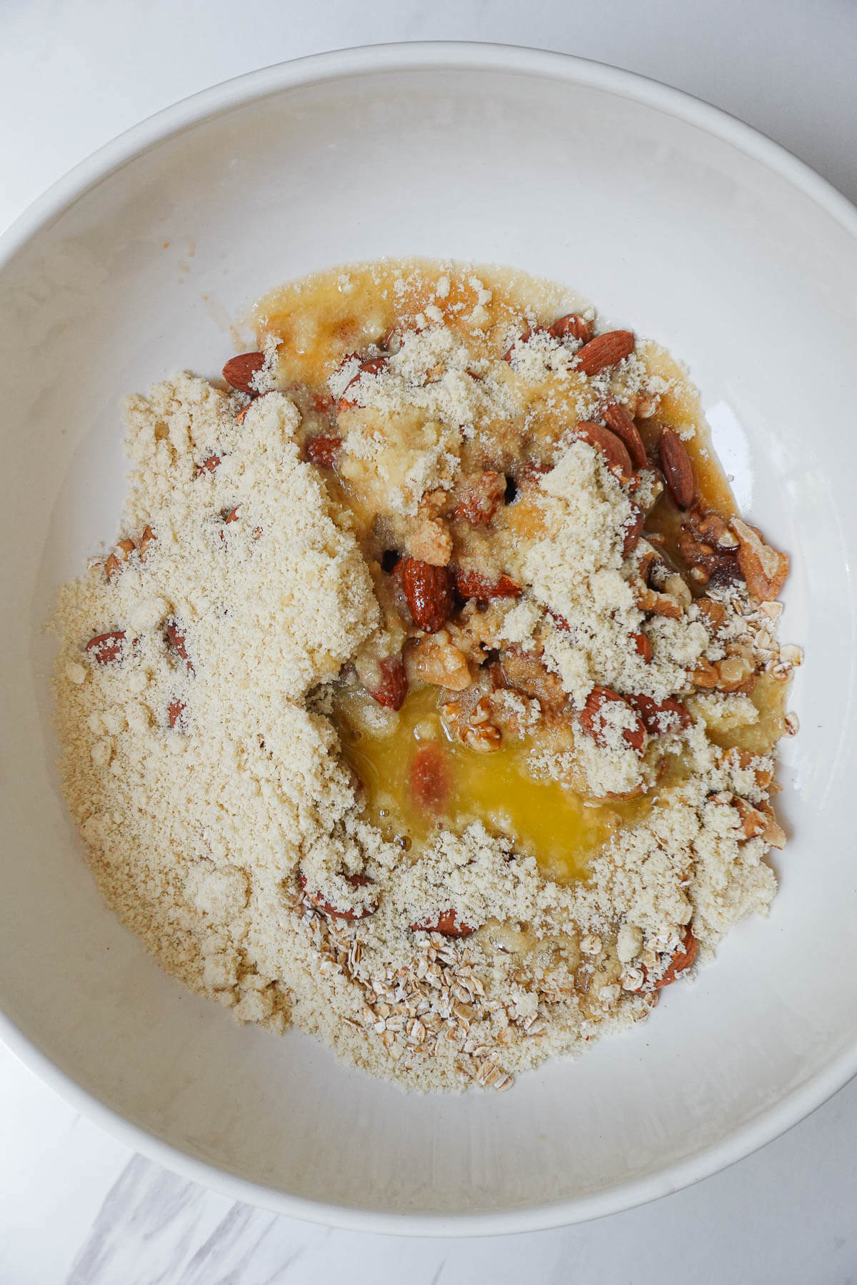 Ingredients to make the crisp topping in a bowl.