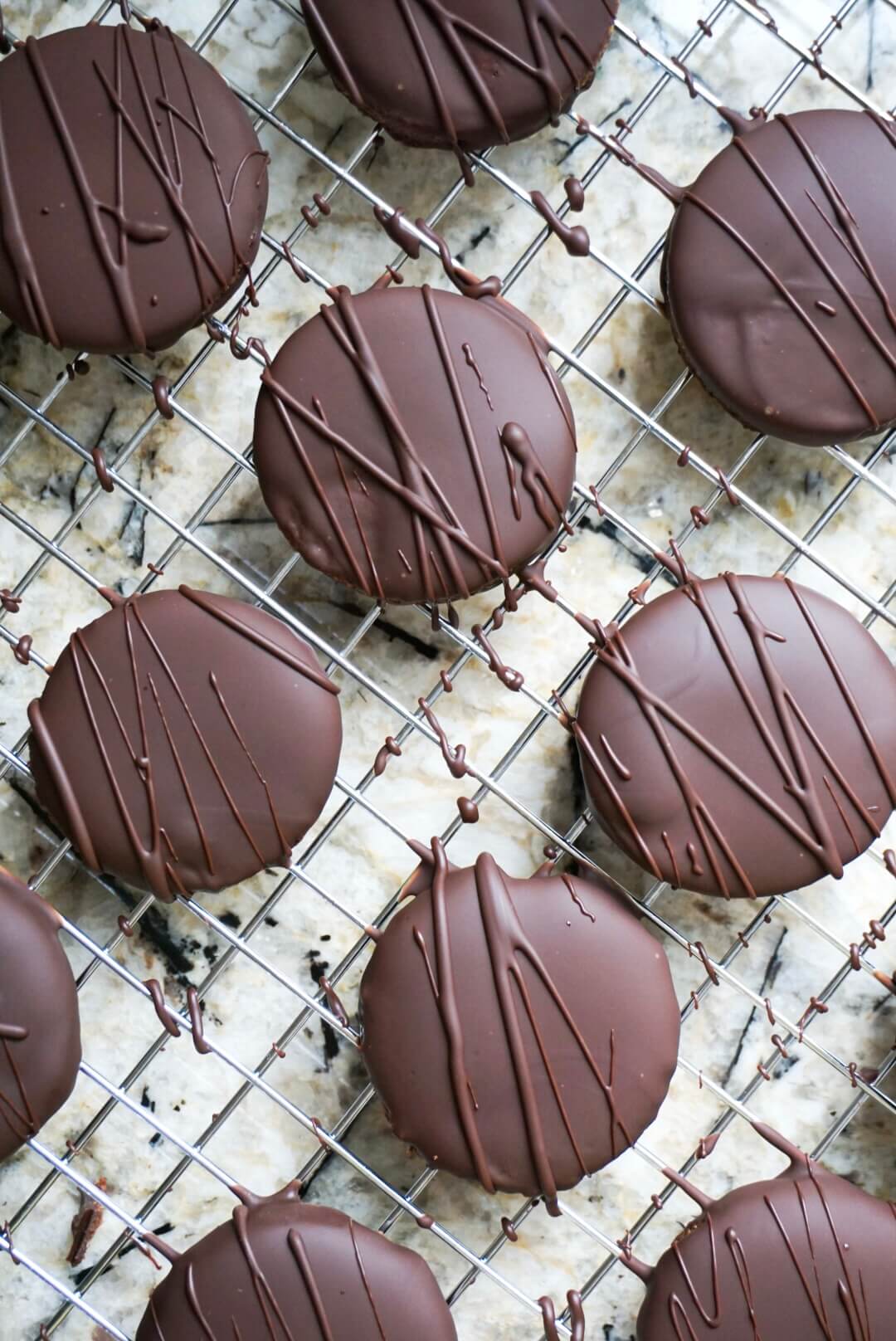 These Homemade Thin Mints taste like the real thing but are much healthier! Just 7 simple ingredients. Vegan, gluten free & refined sugar free.