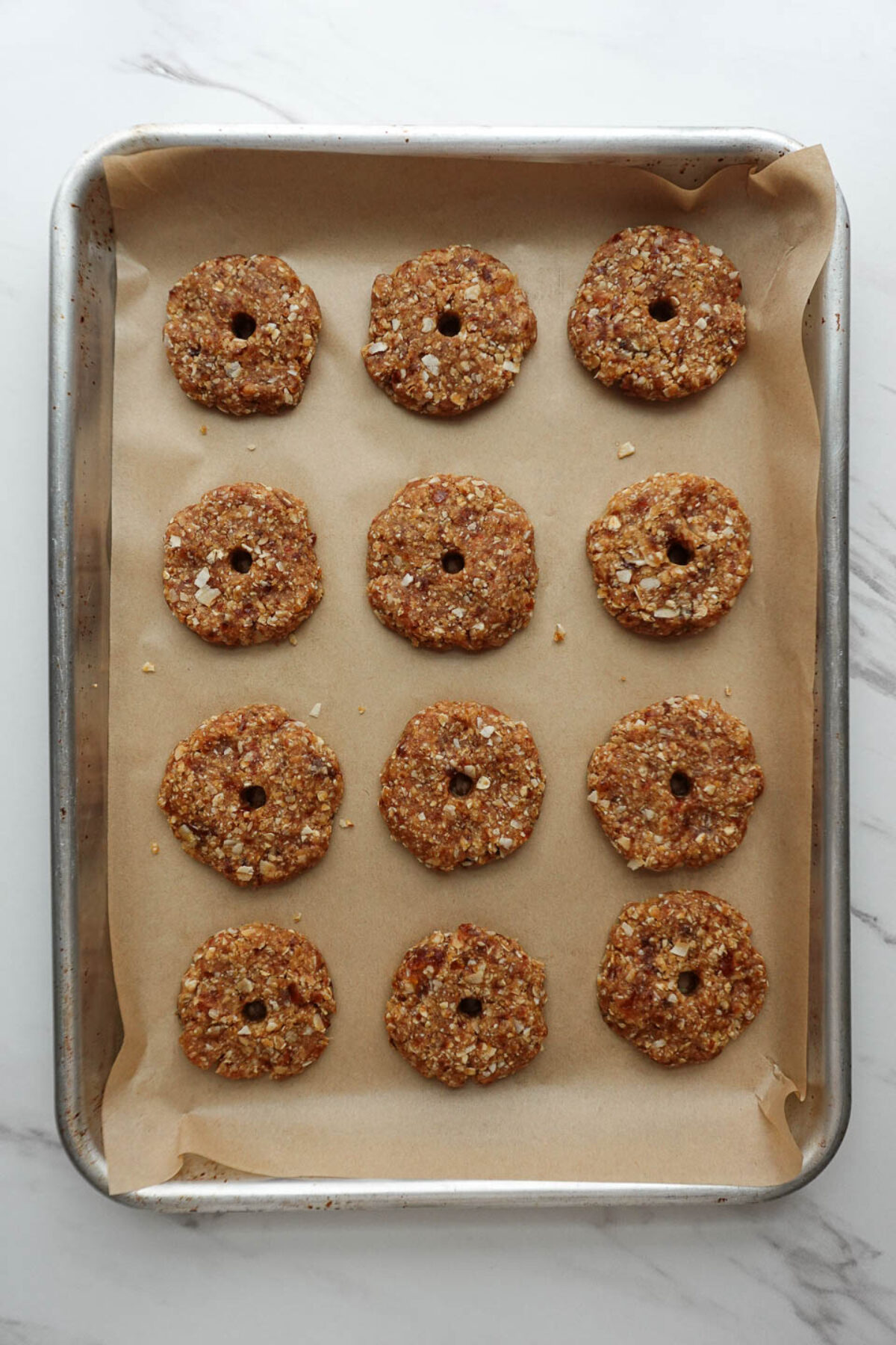 samoas cookies on a baking sheet before freezing