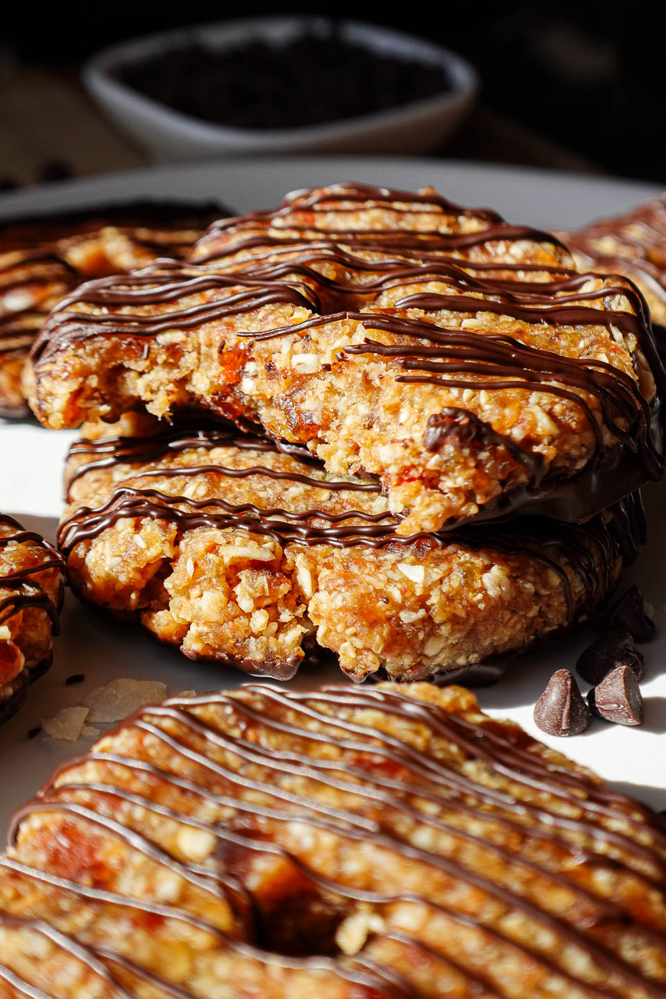 Soft and chewy inside of a homemade healthy samoas cookie made with medjool dates, coconut, and dark chocolate