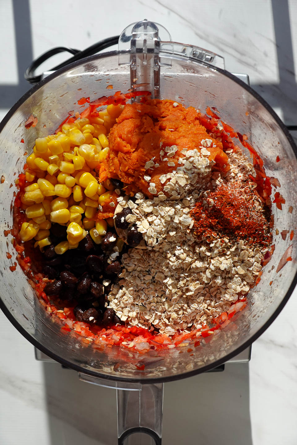 Veggie burger ingredients in a food processor