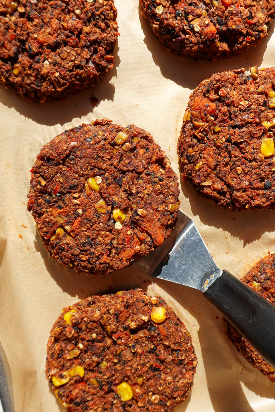 Black bean sweet potato burgers baked on a sheet pan
