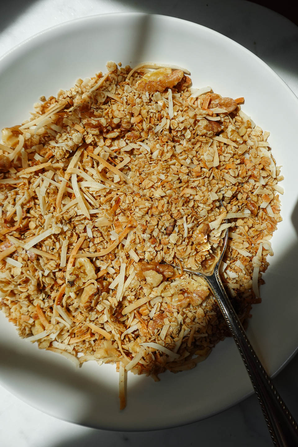 the best healthy granola in a white bowl