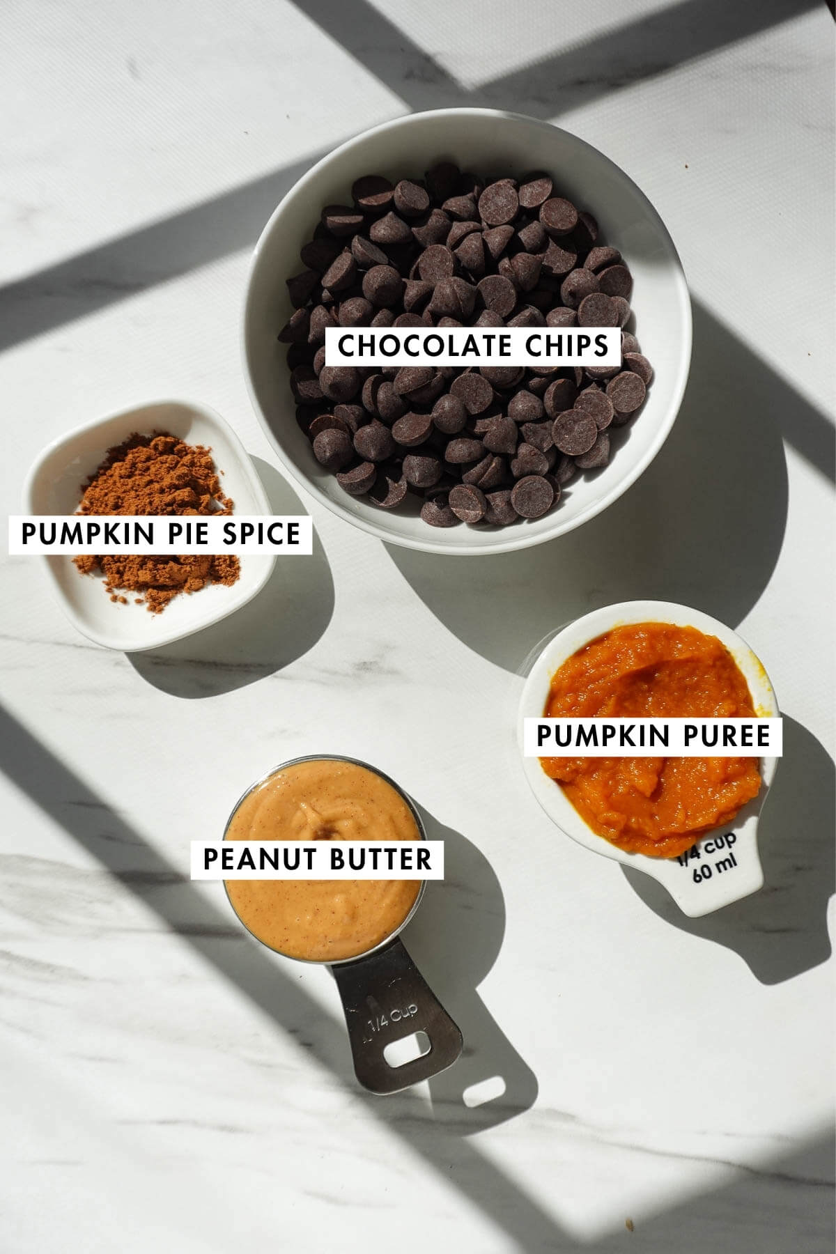 Measured ingredients needed to make pumpkin peanut butter cups.