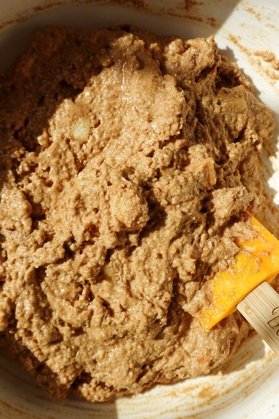 mixing batter for apple bread