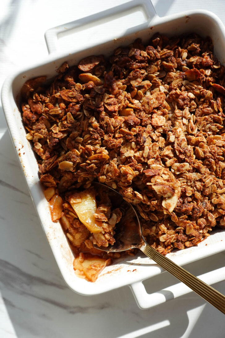 Freshly baked apple crisp with golden oat topping and tender apple filling.