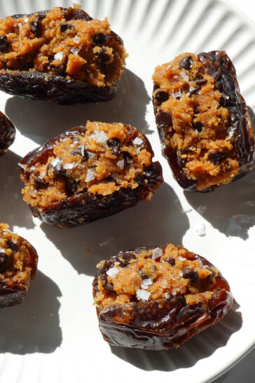 Pumpkin stuffed dates filled with pumpkin cookie dough and topped with chocolate chips.