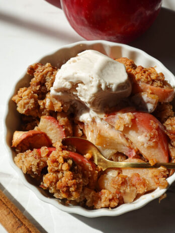 Mini apple crisp baked in one ramekin with oats, nuts, and maple syrup—easy vegan and gluten-free fall dessert for one.”