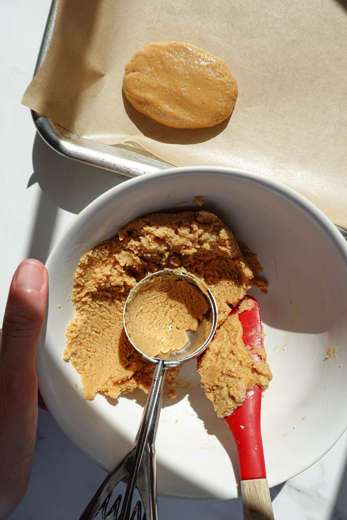Shaping peanut butter mixture into egg shapes for homemade peanut butter eggs
