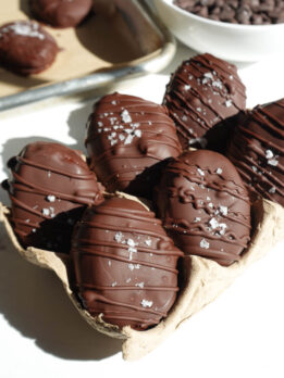 vegan chocolate peanut butter eggs in an egg containers