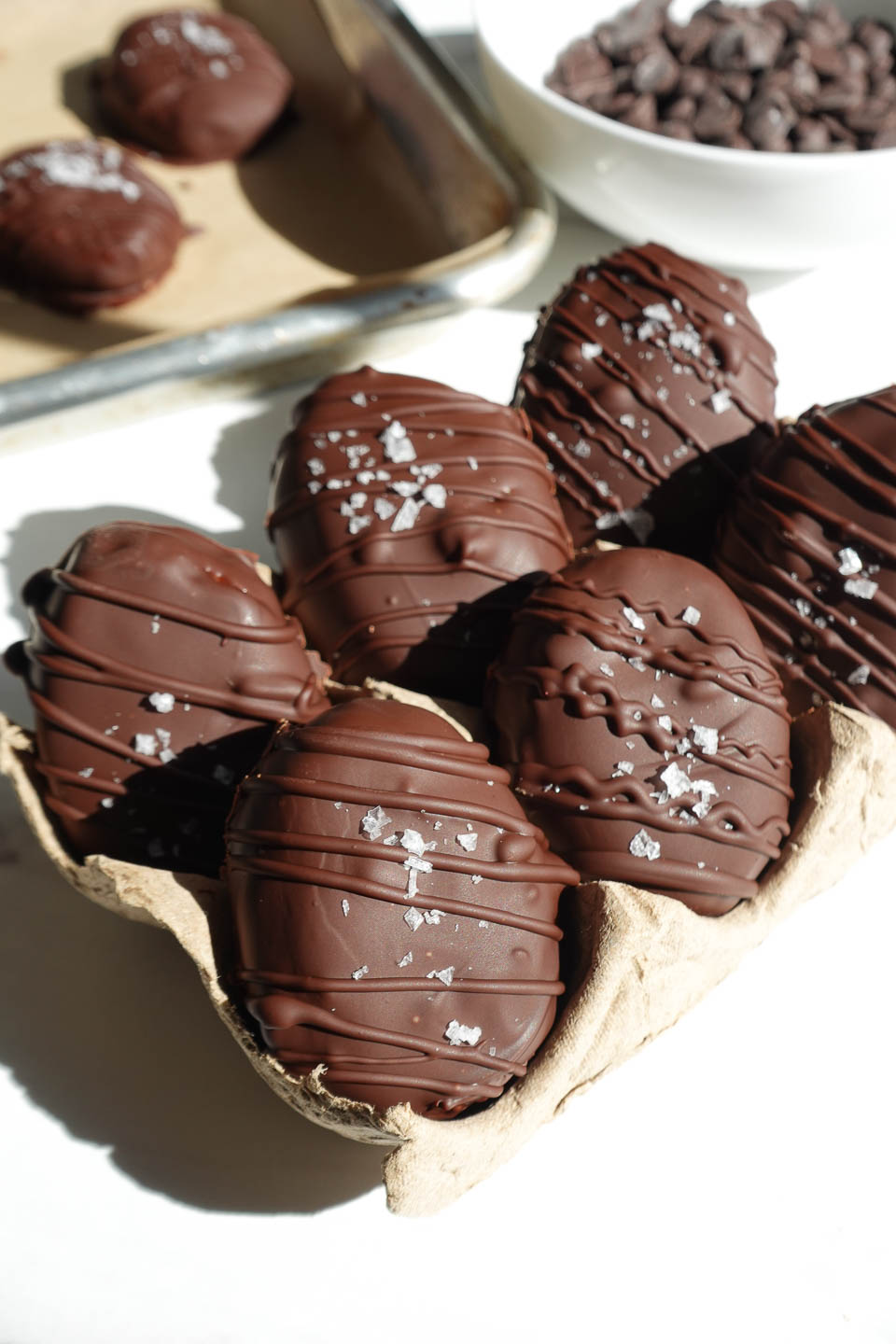 vegan chocolate peanut butter eggs in an egg containers