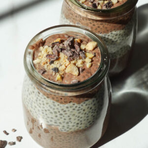 Chocolate peanut butter chia pudding in jars for a meal prep breakfast or healthy snack