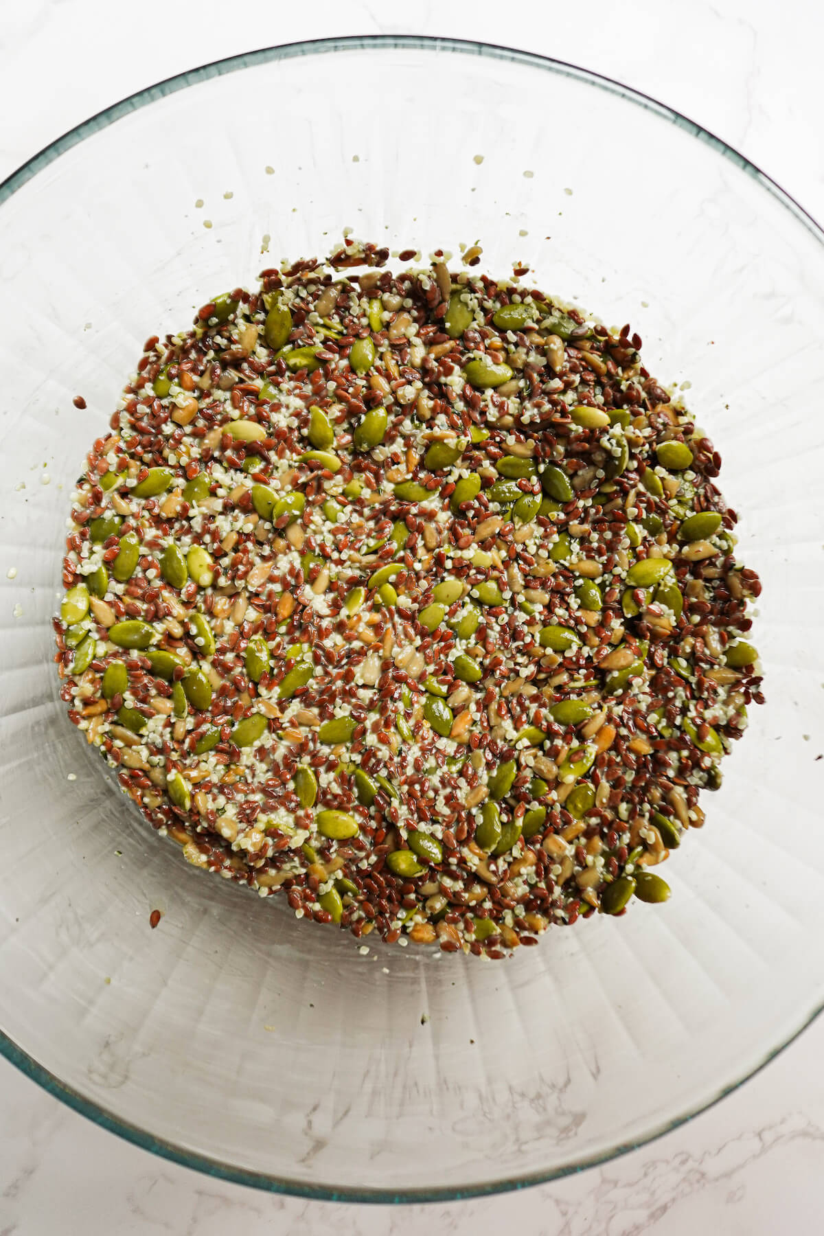 mixing all the ingredients for flax seed crackers in a bowl