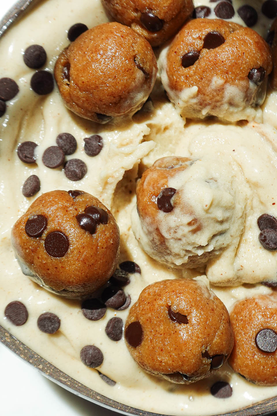 Creamy texture of banana nice cream with chunks of edible cookie dough throughout