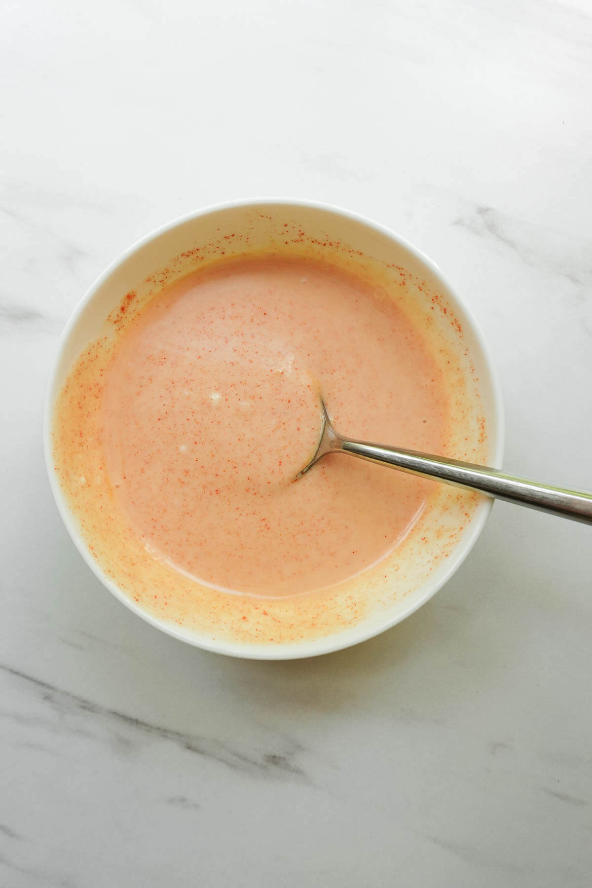 Fully mixed street corn salad dressing.