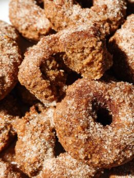 Inside texture of vegan apple cider donut showing fluffy texture and crumb