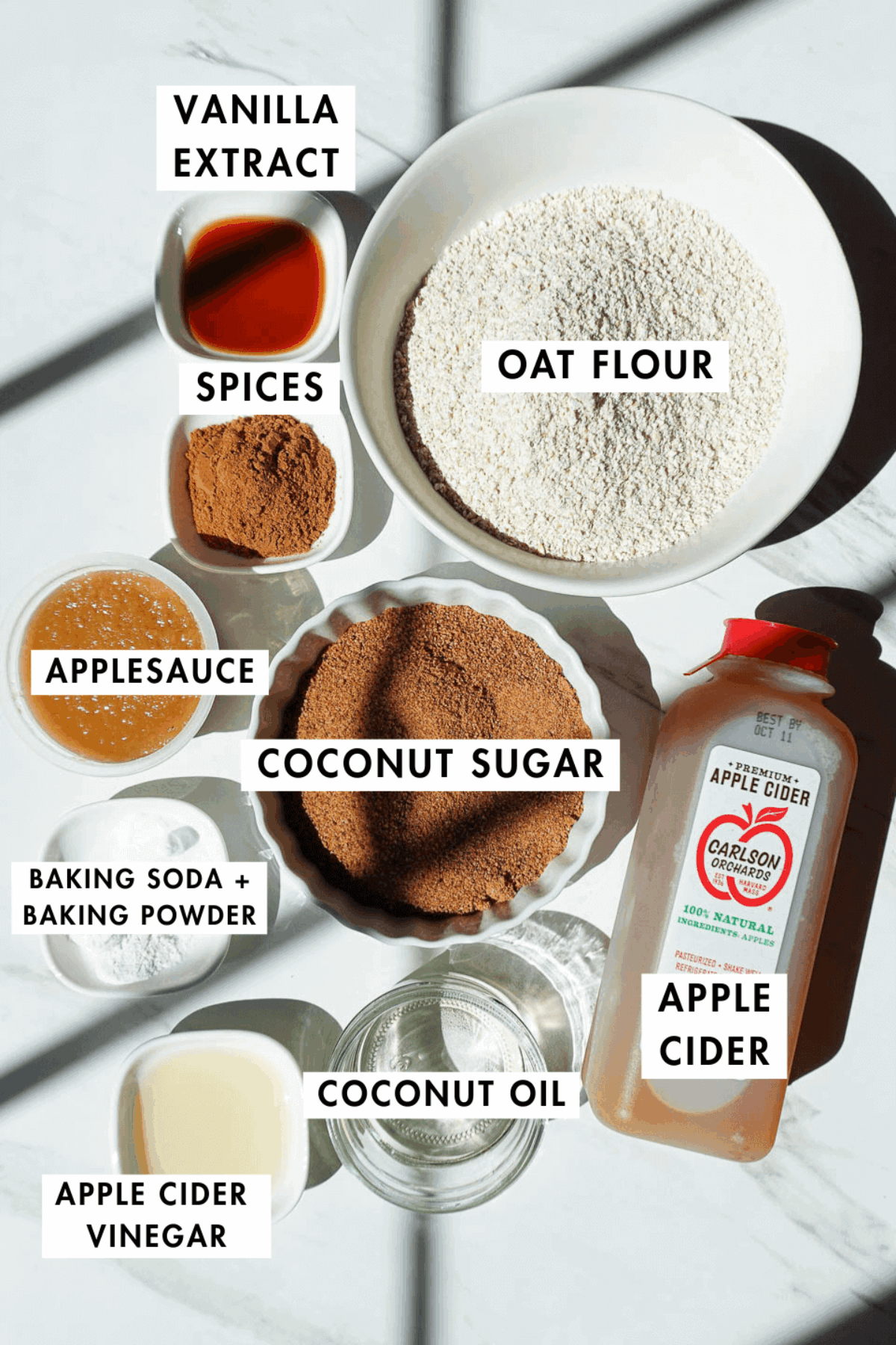 Flat lay of ingredients for baked apple cider donuts