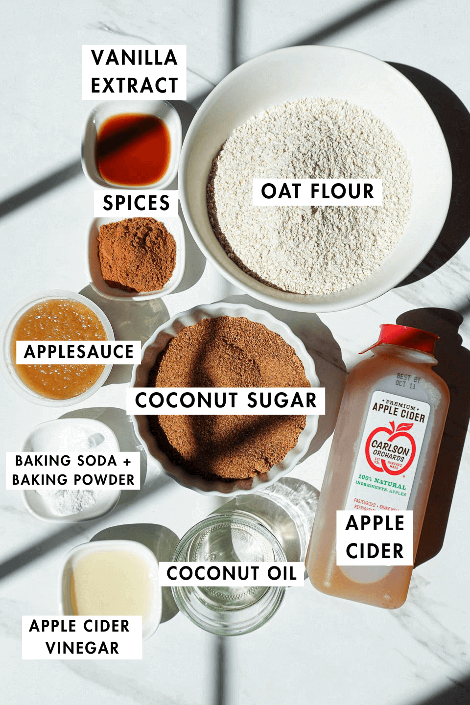 Flat lay of ingredients for baked apple cider donuts