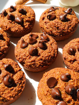 freshly baked batch of vegan and gluten-free pumpkin muffins