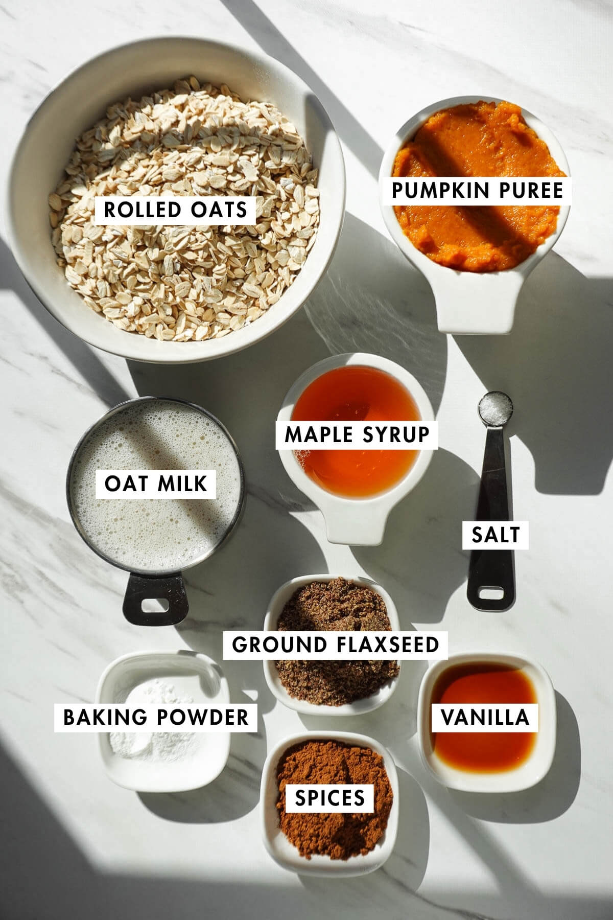 Measured ingredients for vegan pumpkin baked oatmeal.