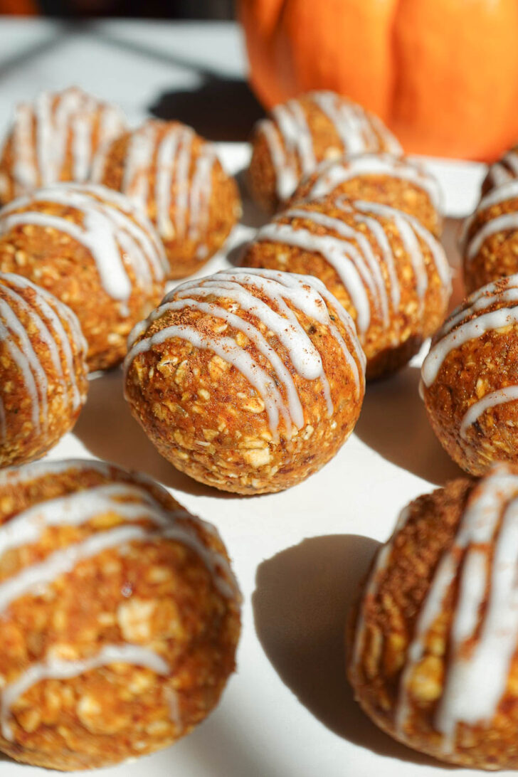 Pumpkin spice energy balls served on a plate for a healthy fall snack.