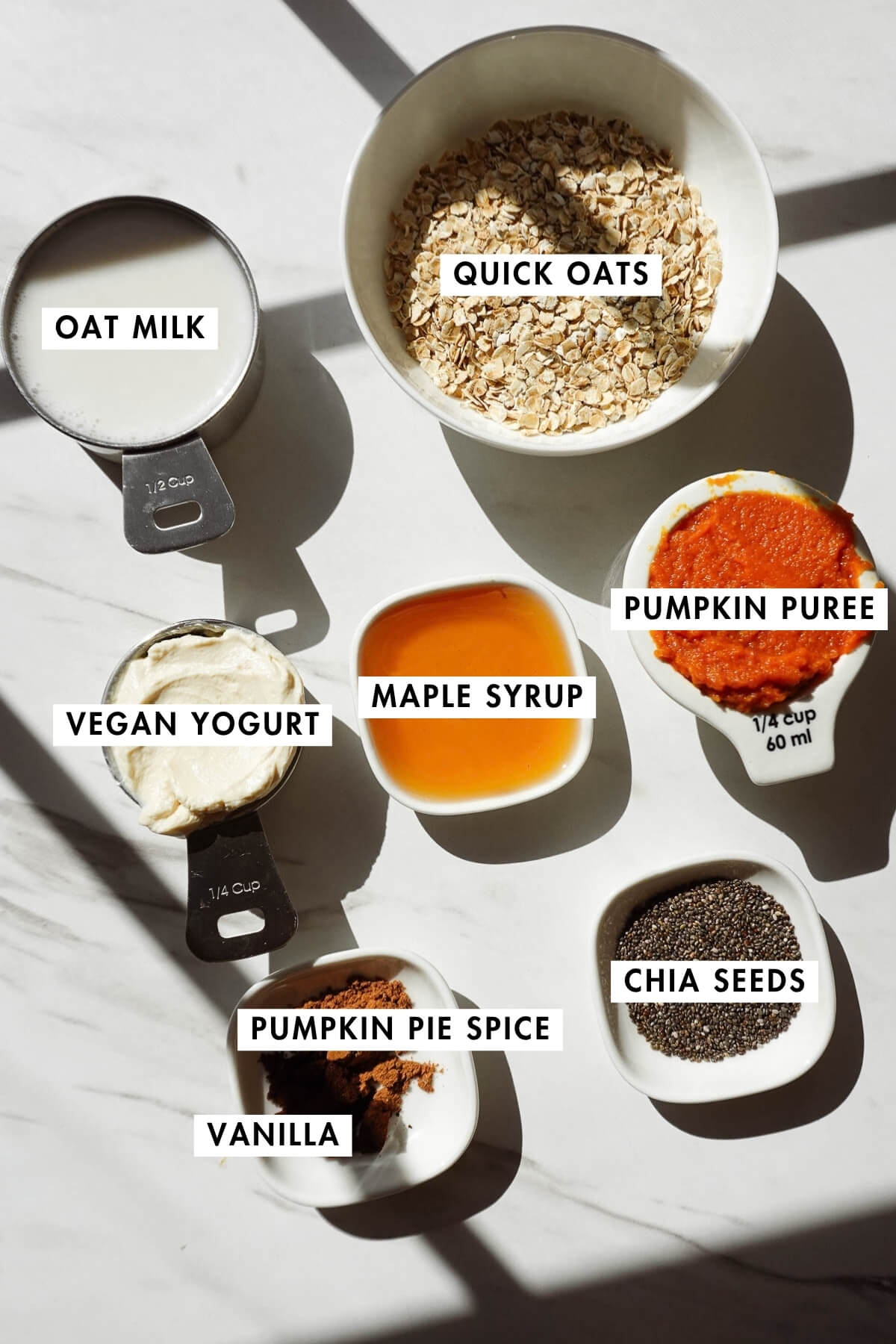 Measured ingredients to make pumpkin pie overnight oats.