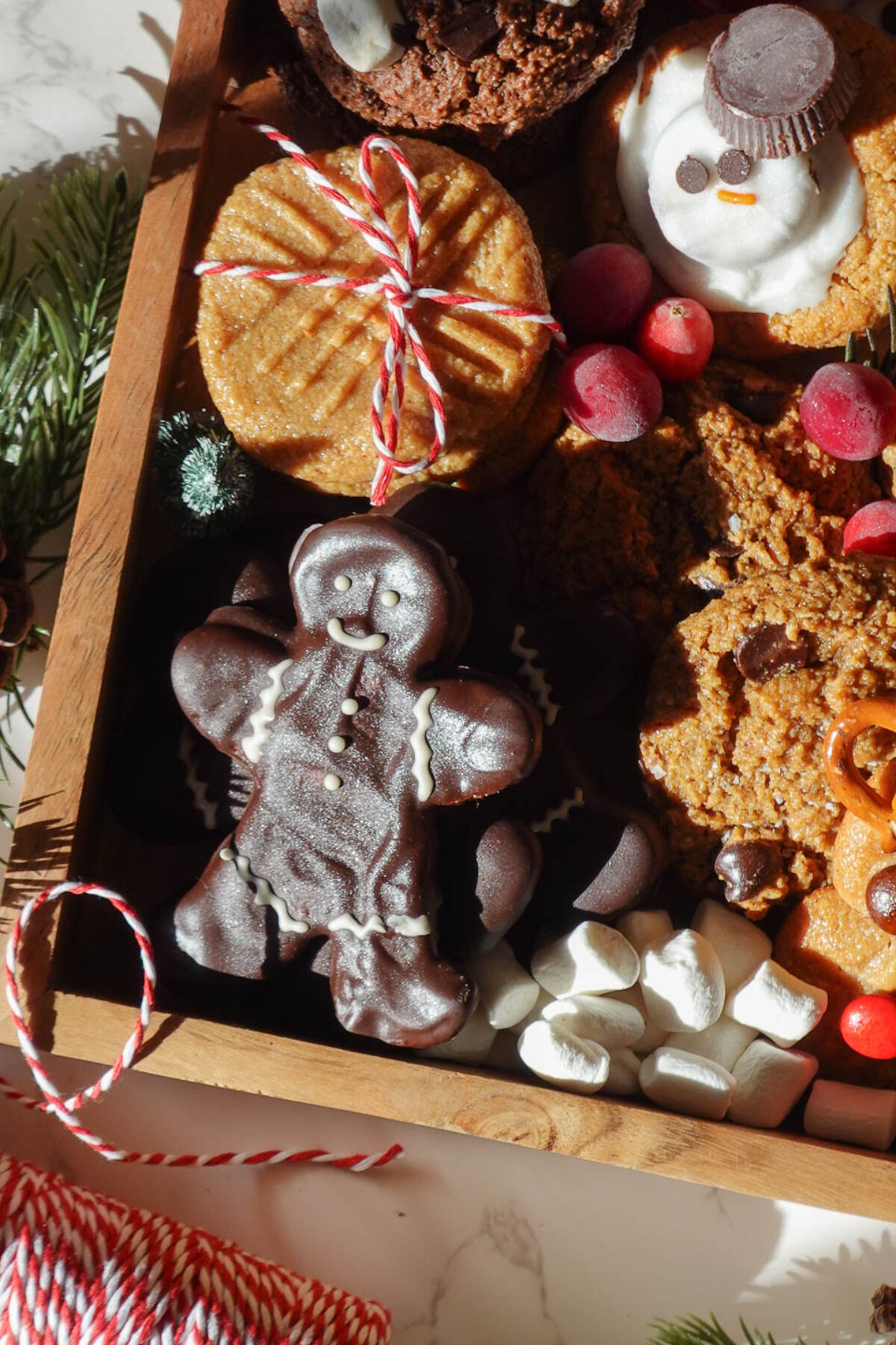 Homemade Christmas cookie box filled with a variety of vegan, dairy-free, and gluten-free holiday cookies