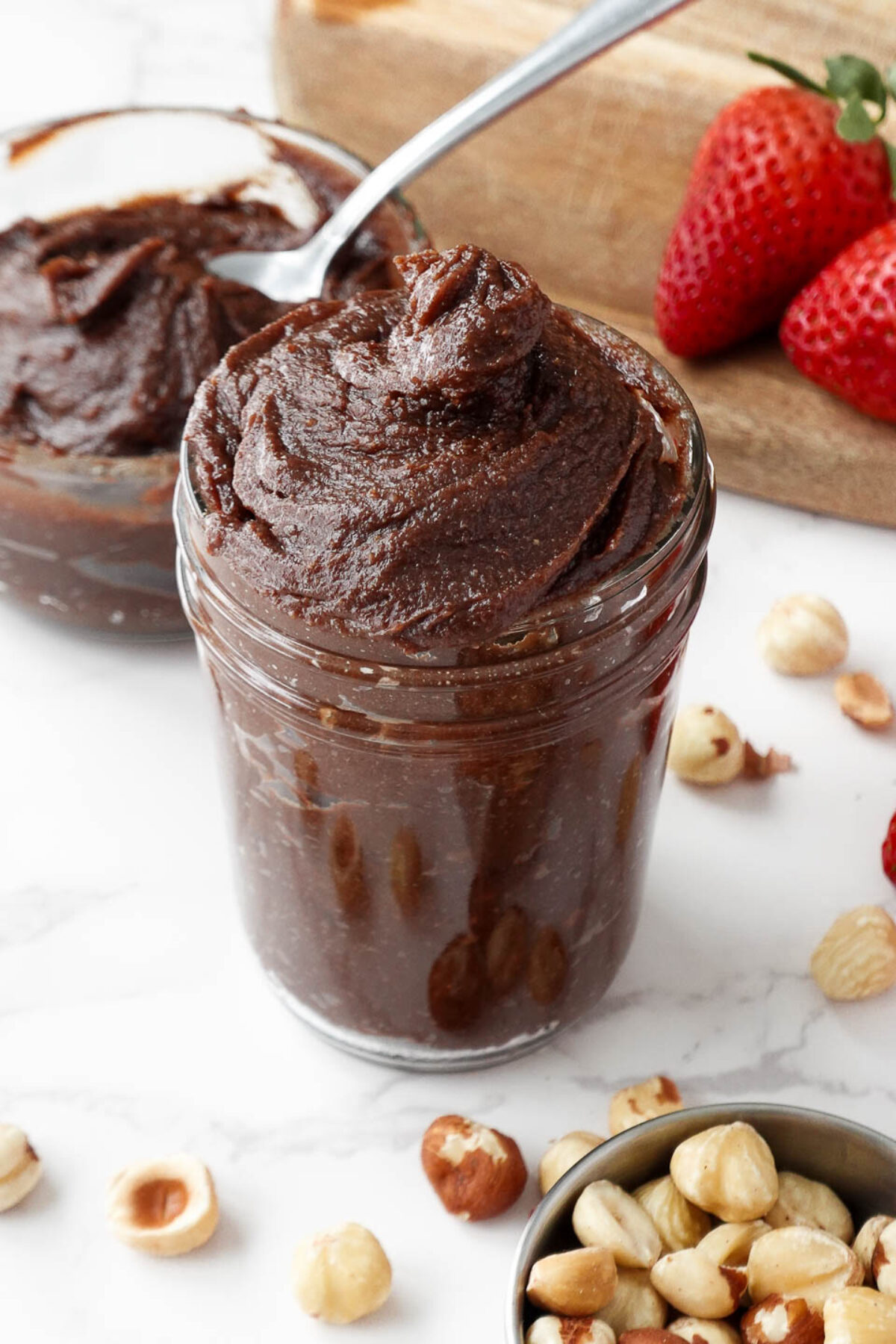 Glass jar filled with vegan chocolate hazelnut spread