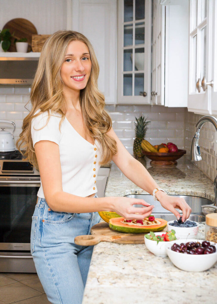 Megan making papaya yogurt boat
