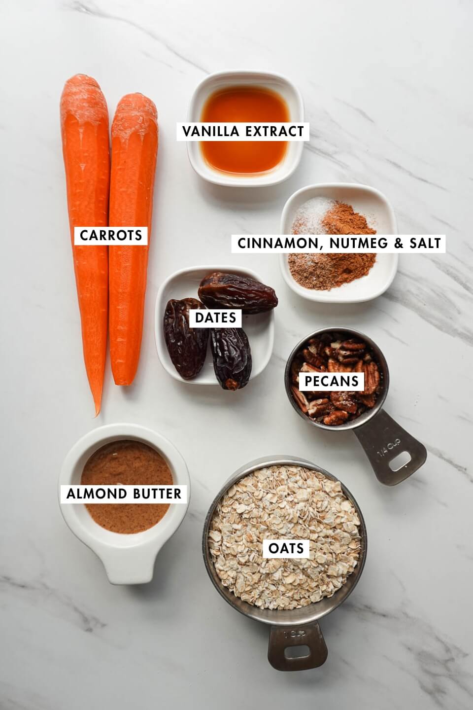 Ingredients for carrot cake energy balls including dates carrots and walnuts