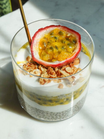 jar of passionfruit chia pudding with half a passionfruit on top