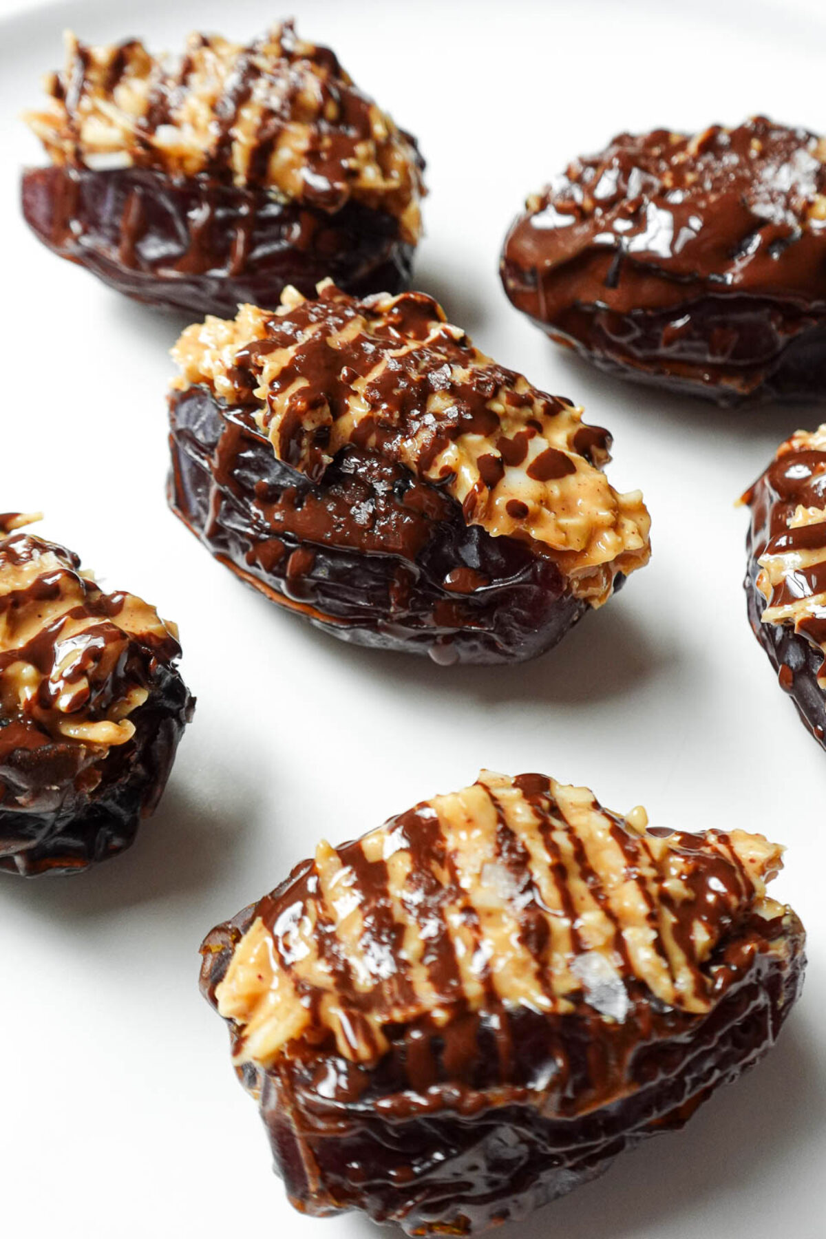 Healthy no-bake Samoas Stuffed Dates made with peanut butter, coconut, and Medjool dates.