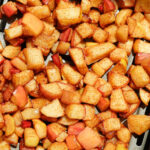 Close-up of diced apples cooked in the air fryer until golden
