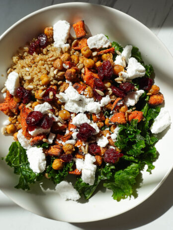 fall quinoa salad with sweet potatoes, kale, chickpeas, cranberries, pumpkin seeds, and vegan feta