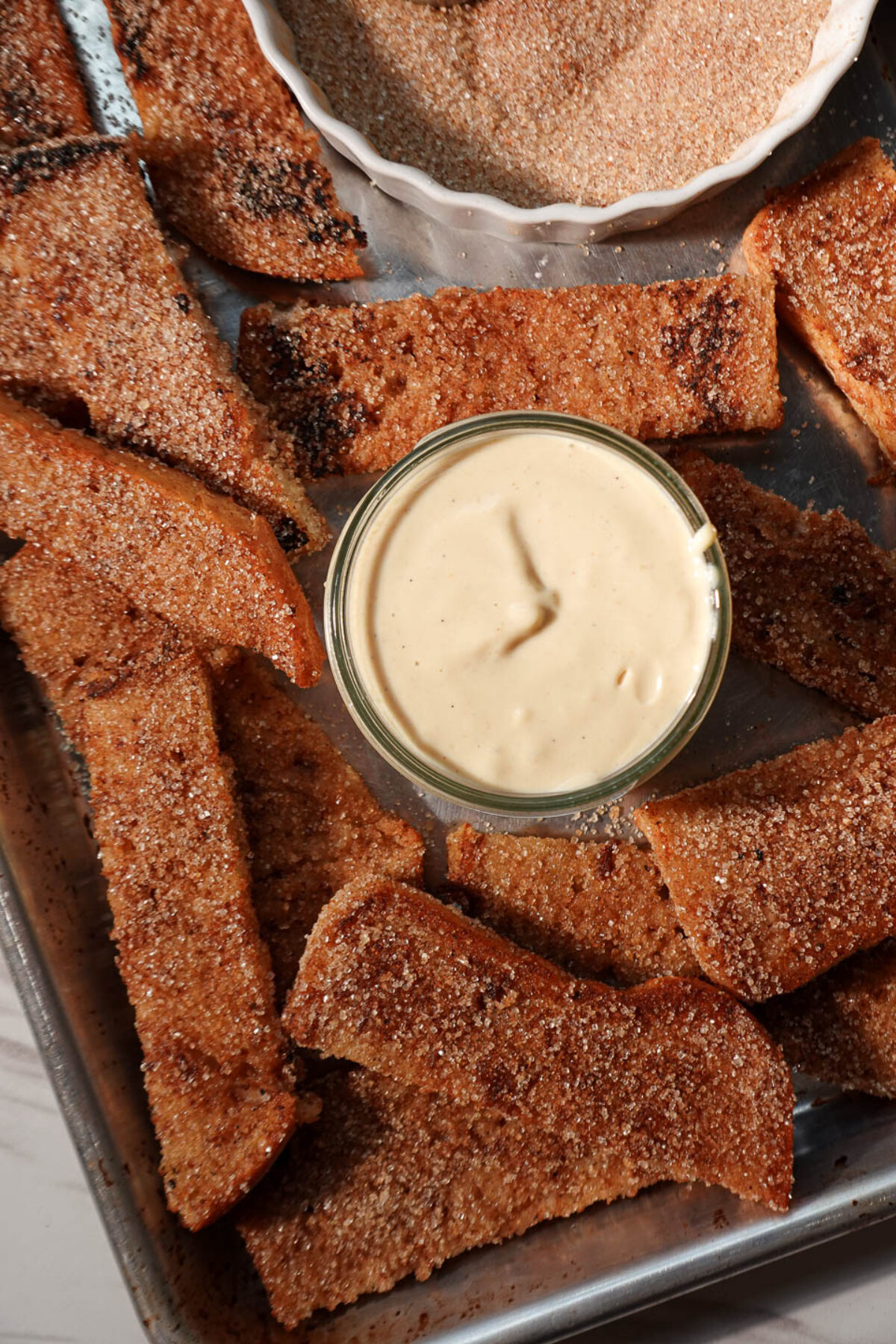 Platter of vegan gingerbread French toast sticks served with yogurt dip