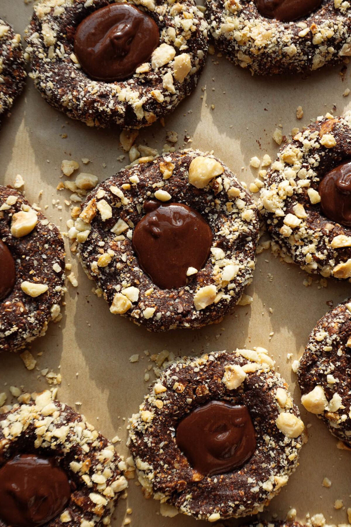 Close-up of no-bake chocolate hazelnut cookies with crunchy hazelnut coating and creamy chocolate hazelnut centers.