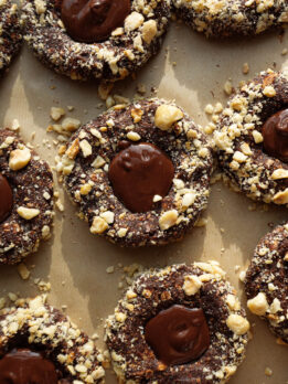 Close-up of no-bake chocolate hazelnut cookies with crunchy hazelnut coating and creamy chocolate hazelnut centers.
