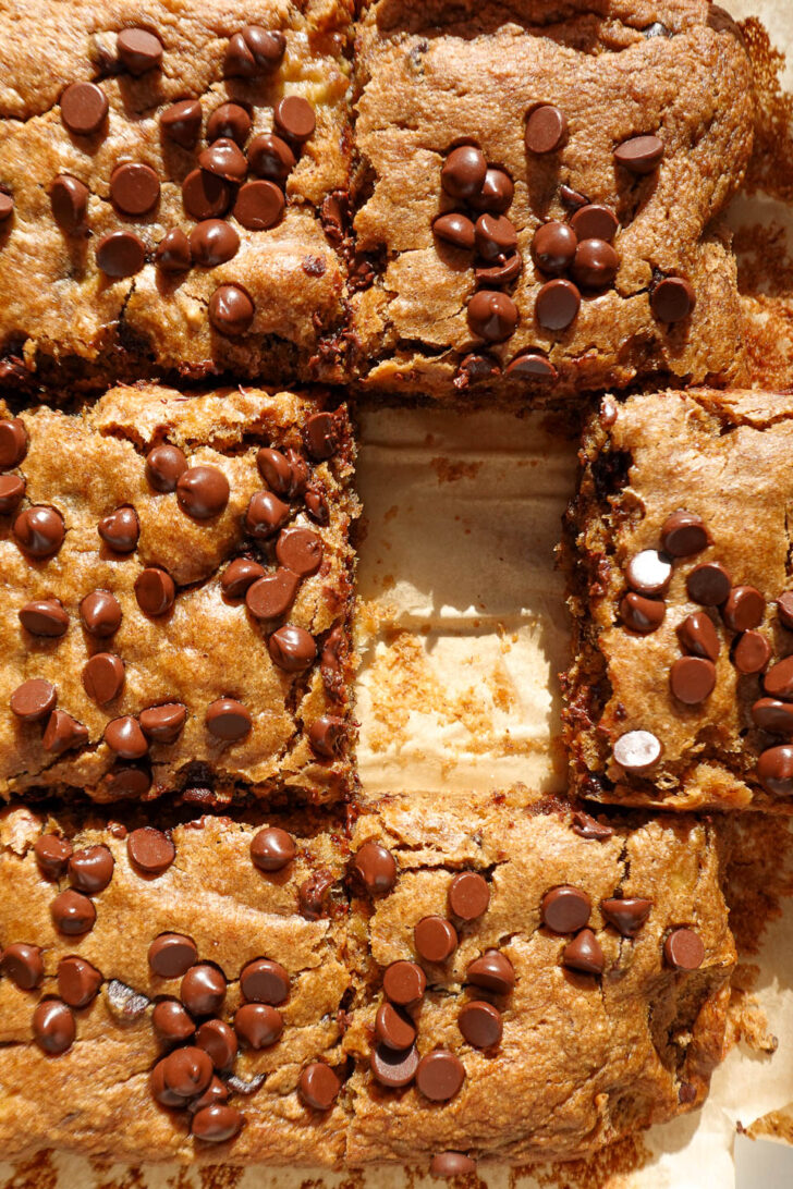 vegan and gluten-free chocolate chip banana bars sliced into squares