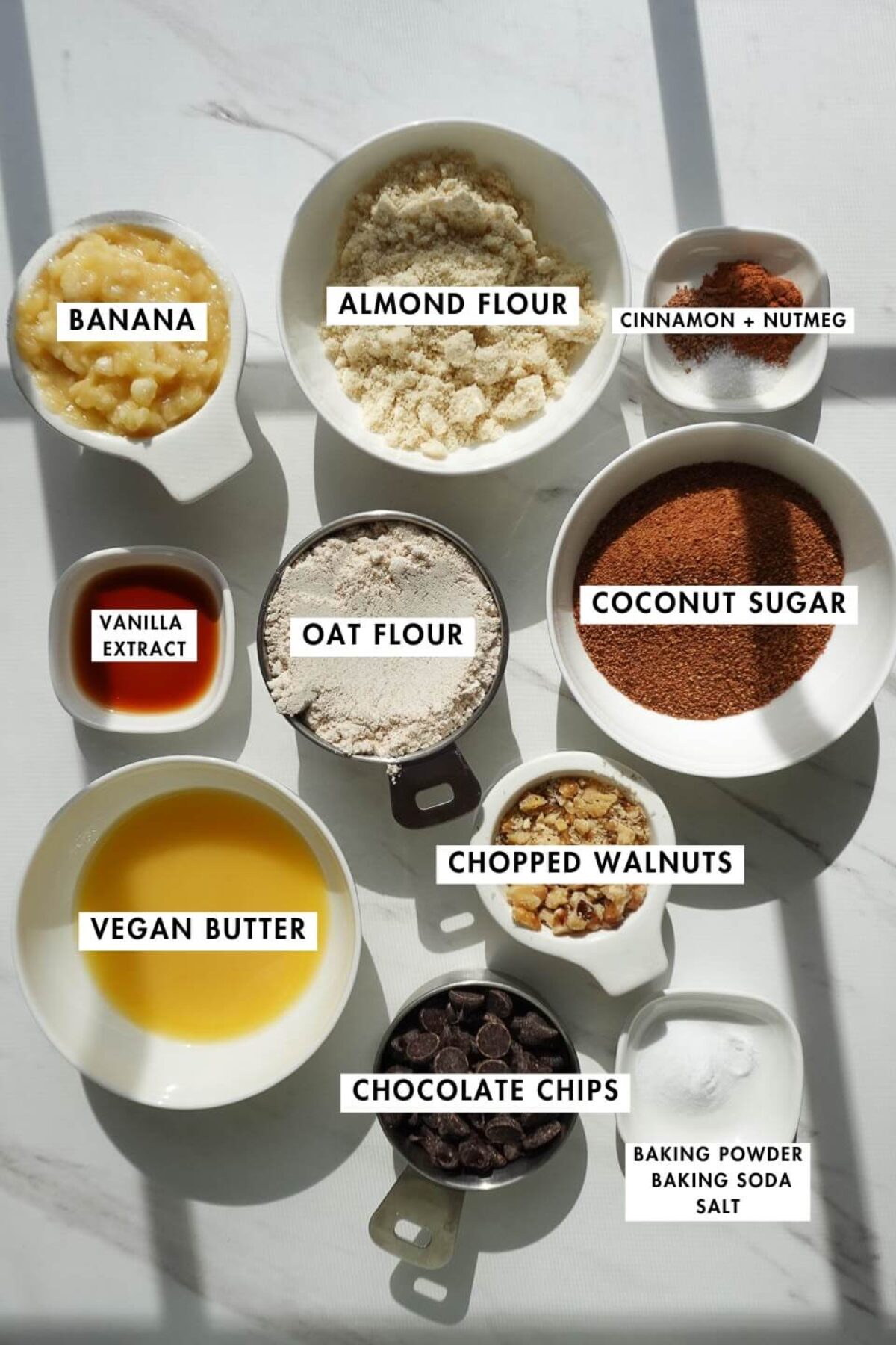 ingredients needed for banana bread cookies including oat flour, almond flour, banana, vegan butter