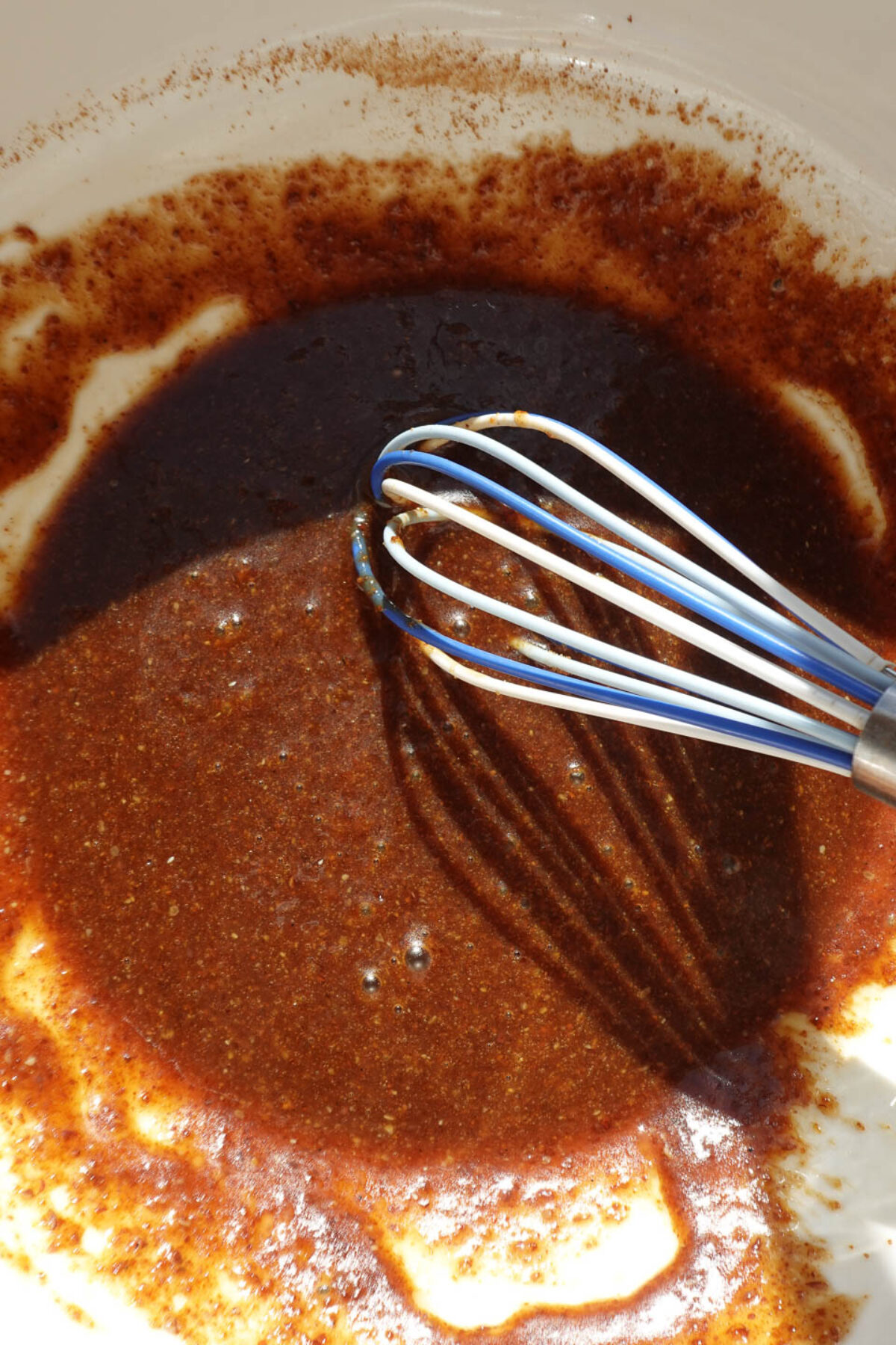 Mixing wet ingredients for carrot cake coffee cake