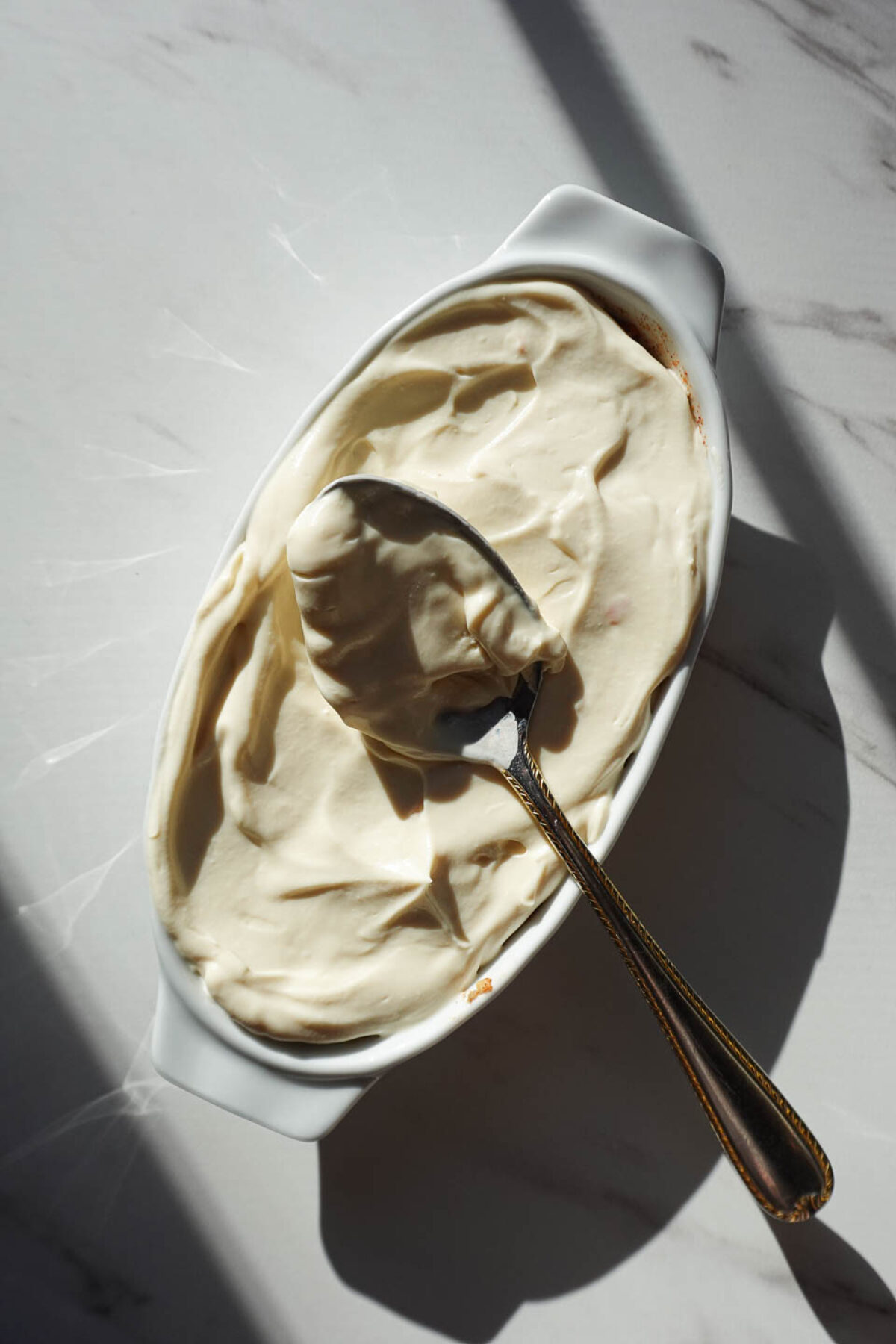 adding yogurt to carrot overnight oats