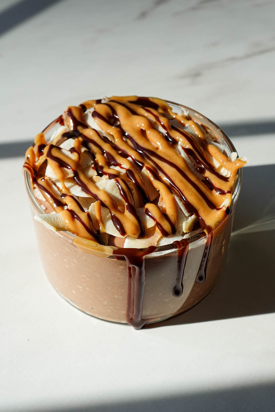 Chocolate coconut overnight oats in a jar, inspired by Samoas Girl Scout cookies