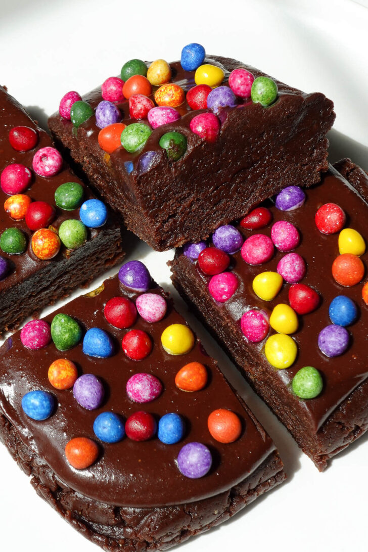 Close-up of no bake cosmic brownies showing their moist and fudgy texture.