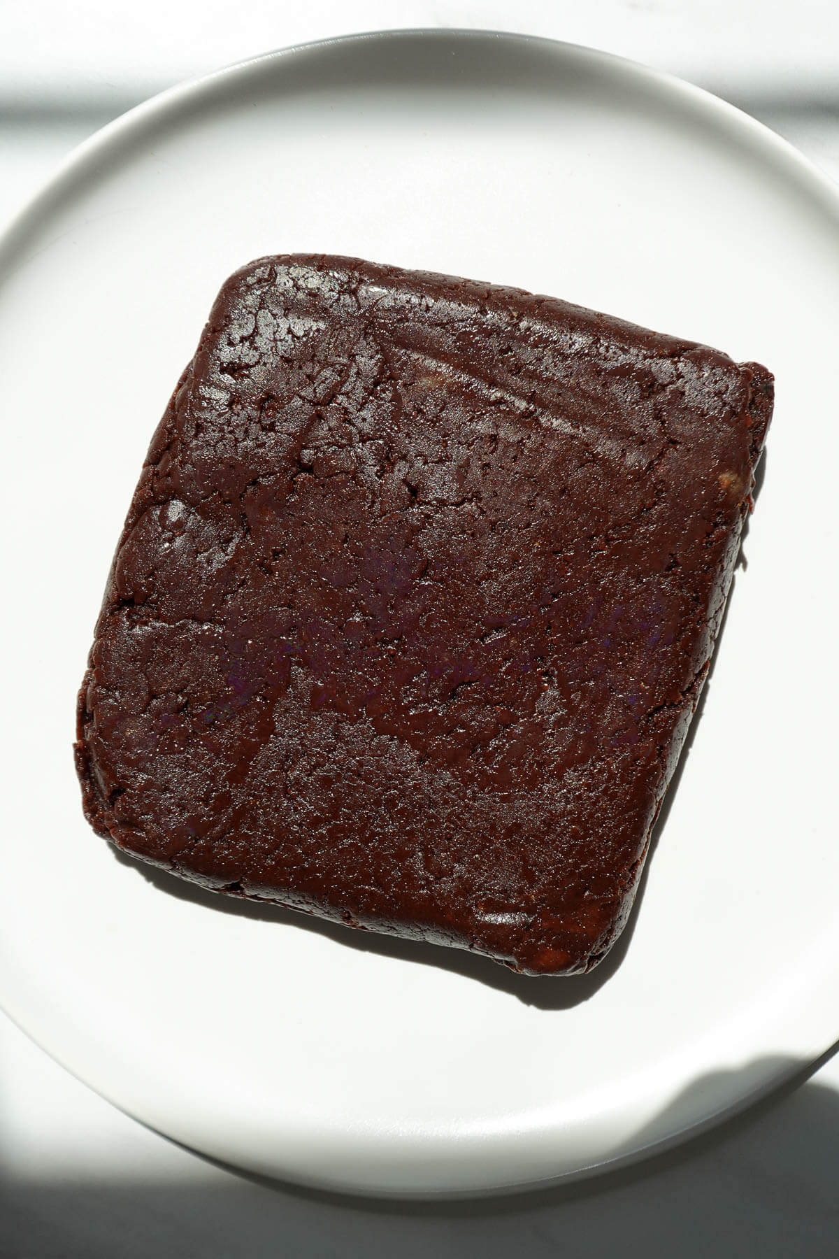 No bake cosmic brownies on a plate before adding the frosting.