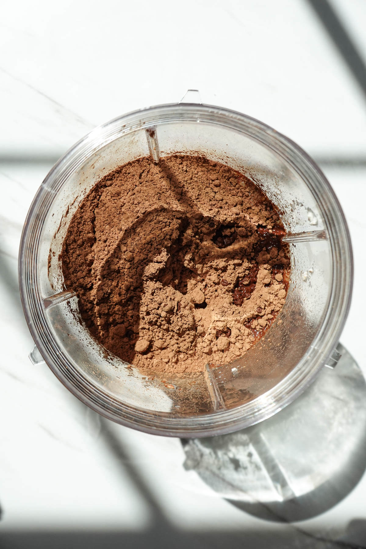 Ingredients for vegan fudgesicles in a blender before blending.