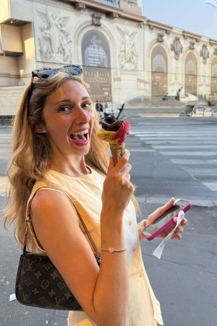 Megan holding ice cream cone in Paris