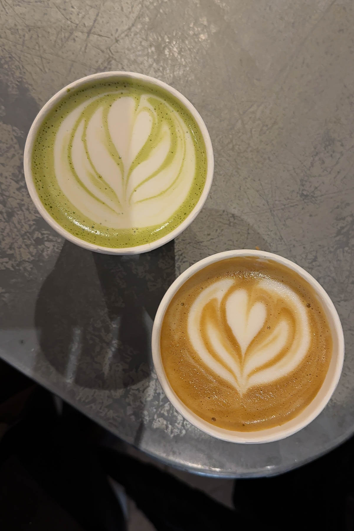 Matcha latte and hot latte from Cafe Noir in Paris