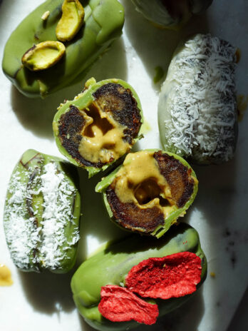 Inside of pistachio matcha stuffed date showing the creamy center.