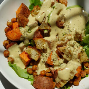 Sweet potato chickpea salad tossed in a creamy vegan honey mustard dressing.